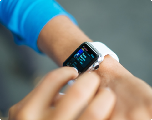 A person operating a smartwatch